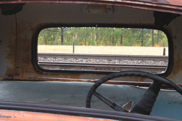 The Mercury truck near the tracks